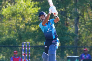 20211003 Strikers batsman Unmukt Chand drives over extra cover for six