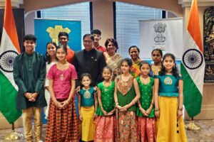 Consul General of India in Chicago Amit Kumar and spouse Surabhi Kumar pose for a picture with some of the children and others attending the Aug. 15, 2022, celebration of India's 75th anniversary of independence. Photo: Indian Consulate