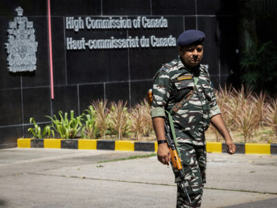 A security personnel stands guard outside the Canadian High-Commision in New Delhi, India, September 19, 2023. REUTERS/Adnan Abidi/File Photo