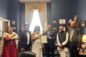 Gurudev Vijay Vasant Maharaj receiving the commendation from IL Congressman Raja Krishnamoorthi on April 9, 2024, in Washington DC. PHOTO: Nitin Vyas