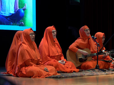 Spiritual songs being sung at the April 21, 2024, "Festival of Bliss" organized by Ananda Marga Wellness and Meditation Center